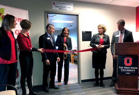 Dean Melnyk cuts the ribbon at the opening of the new Ohio State Total Health and Wellness Clinic in Lima, Ohio