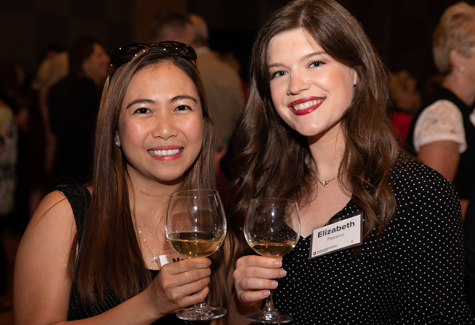 two young women at wine tasting event